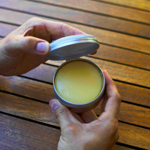Open tin of the Naked Armor Noah's Organic Shaving Soap