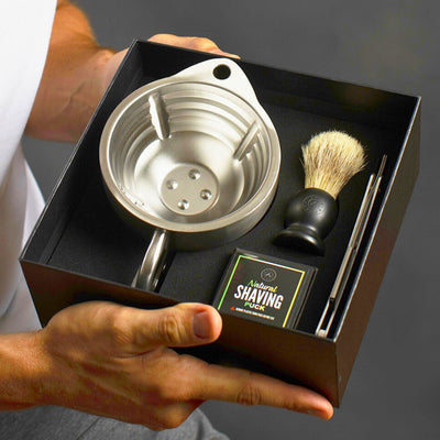 Man holding the Naked Armor Silver Fox Scuttle Kit