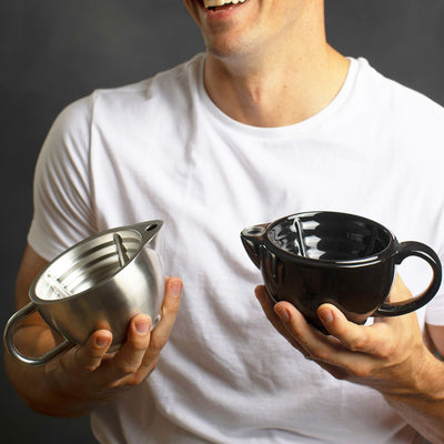 Man holding the Naked Armor Savanna Scuttle and Silver Fox Scuttle
